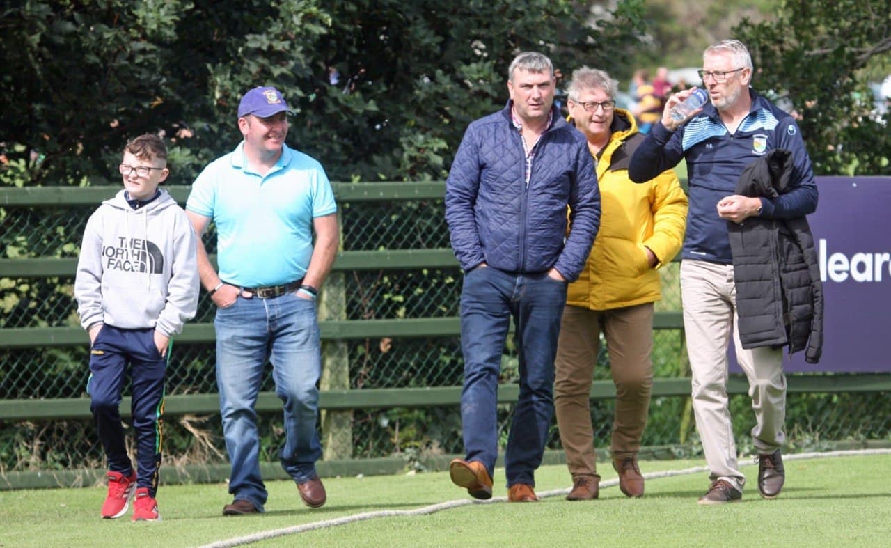 Members walking along the boundary