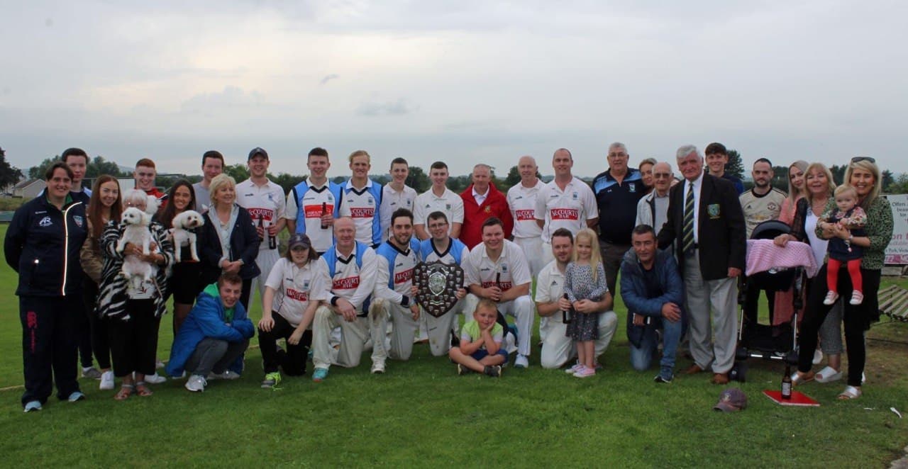 Shield winners with families