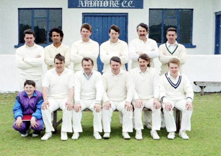 Vintage team photo outside clubhouse